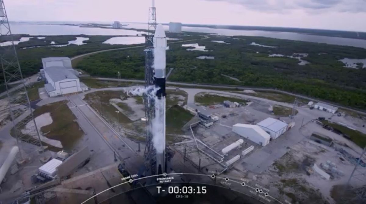 SpaceX&#039;s Falcon 9 rocket and Dragon cargo capsule stand poised to launch toward the International Space Station on July 24, 2019. The launch attempt was nixed because of bad weather.