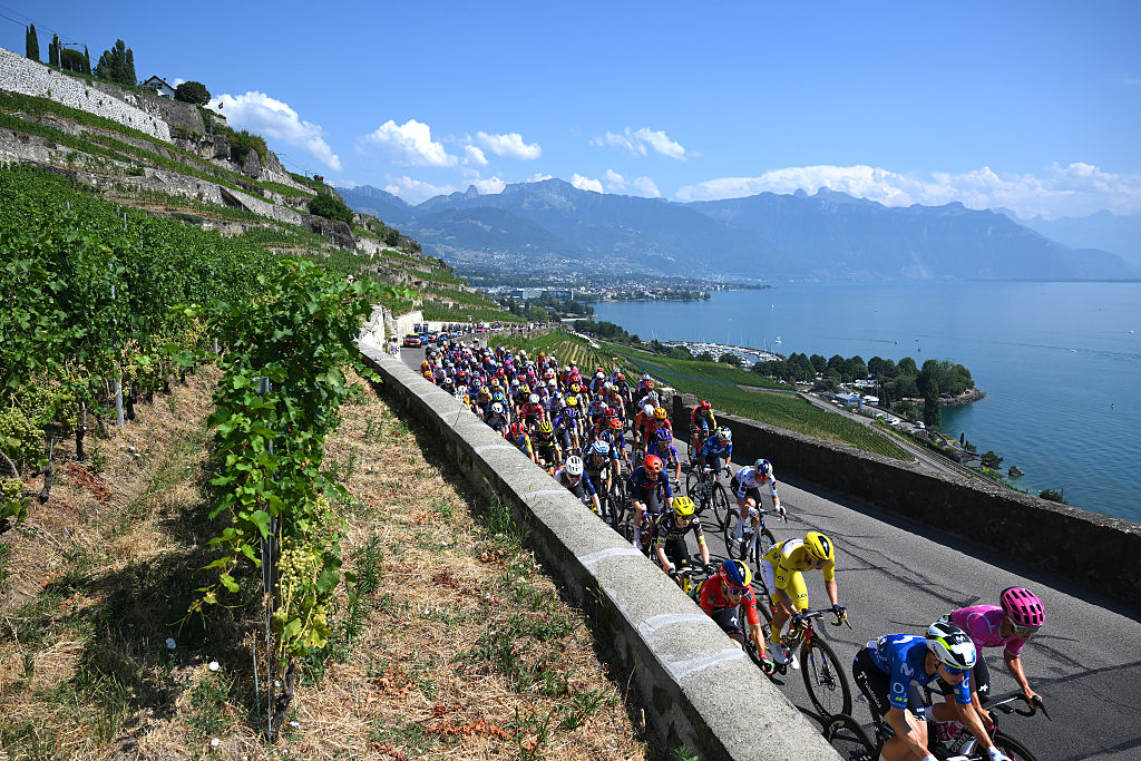 GENEVA, SWITZERLAND - AUGUST 02: A general view of Lorena Wiebes of Netherlands and Team SD Worx - Protime - Yellow leader jersey and the peloton passing through a vineyards landscape in Laussane during the 5th Tour de France Femmes 2026, Stage 2 a 147.9km stage from Aigle to Geneva / #UCIWWT / on August 02, 2026 in Geneva, Switzerland. (Photo by Alex Broadway/Getty Images)