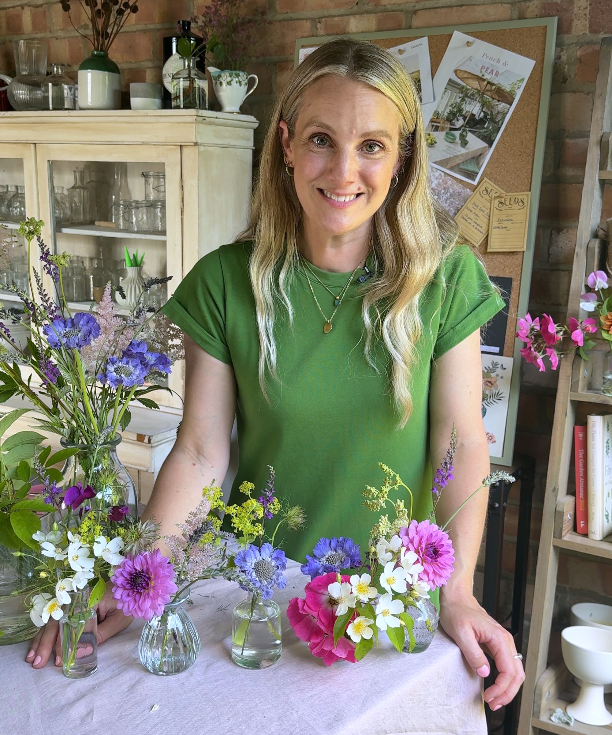 Rachel Bull with her wildflower bud vase arrangements