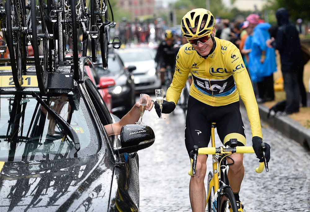 Chris Froome toasts his 2015 Tour de France victory