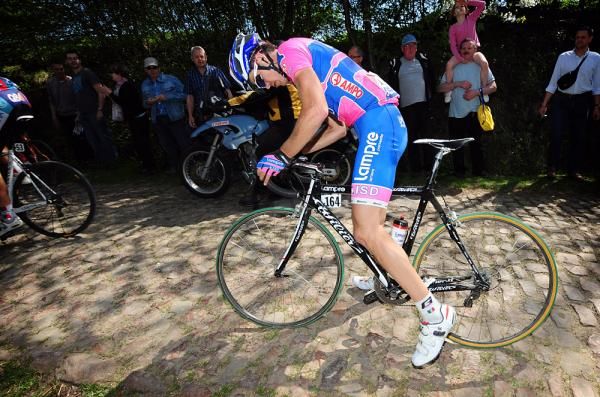 Dmytro Krivtsov (Lampre-ISD) tries to get going again on the cobbles