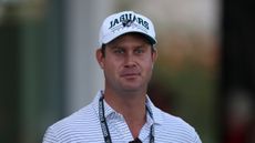 Harris English looks on while wearing a Jacksonville Jaguars cap