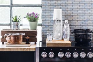 SodaStream machine on worktop in modern kitchen