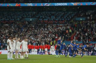 Italy's players celebrate victory against England on penalties in the final of Euro 2020 after Bukayo Saka's miss at Wembley.