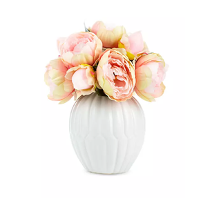 Faux flower arrangement in vase.