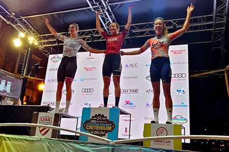 Women's podium at 2024 Littleton Twilight Criterium, with winner Skylar Schneider in centre