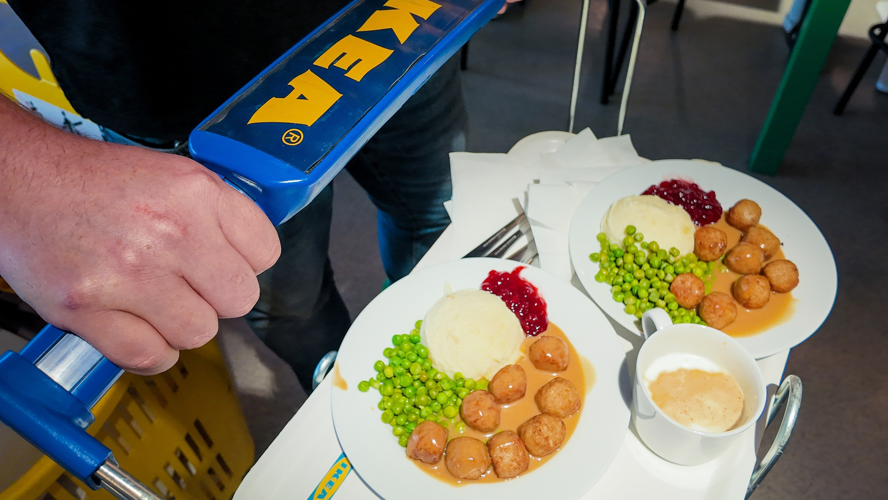 IKEA Swedish meatball meal on two plates and a coffee