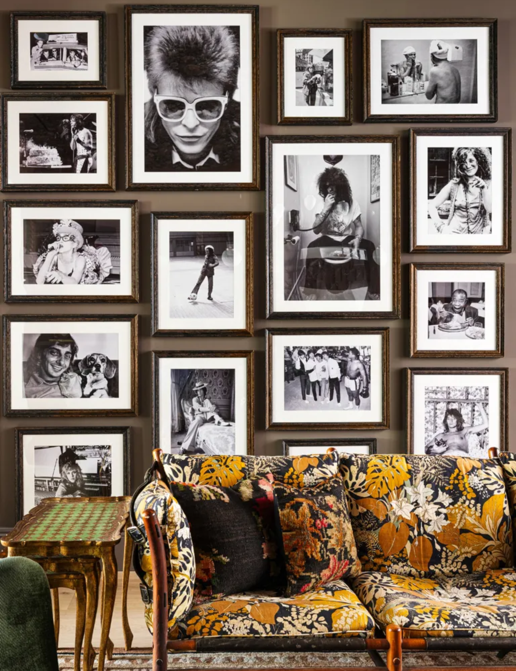 Pattern-filled NYC parlor room featuring a statement gallery wall of black-and-white photography