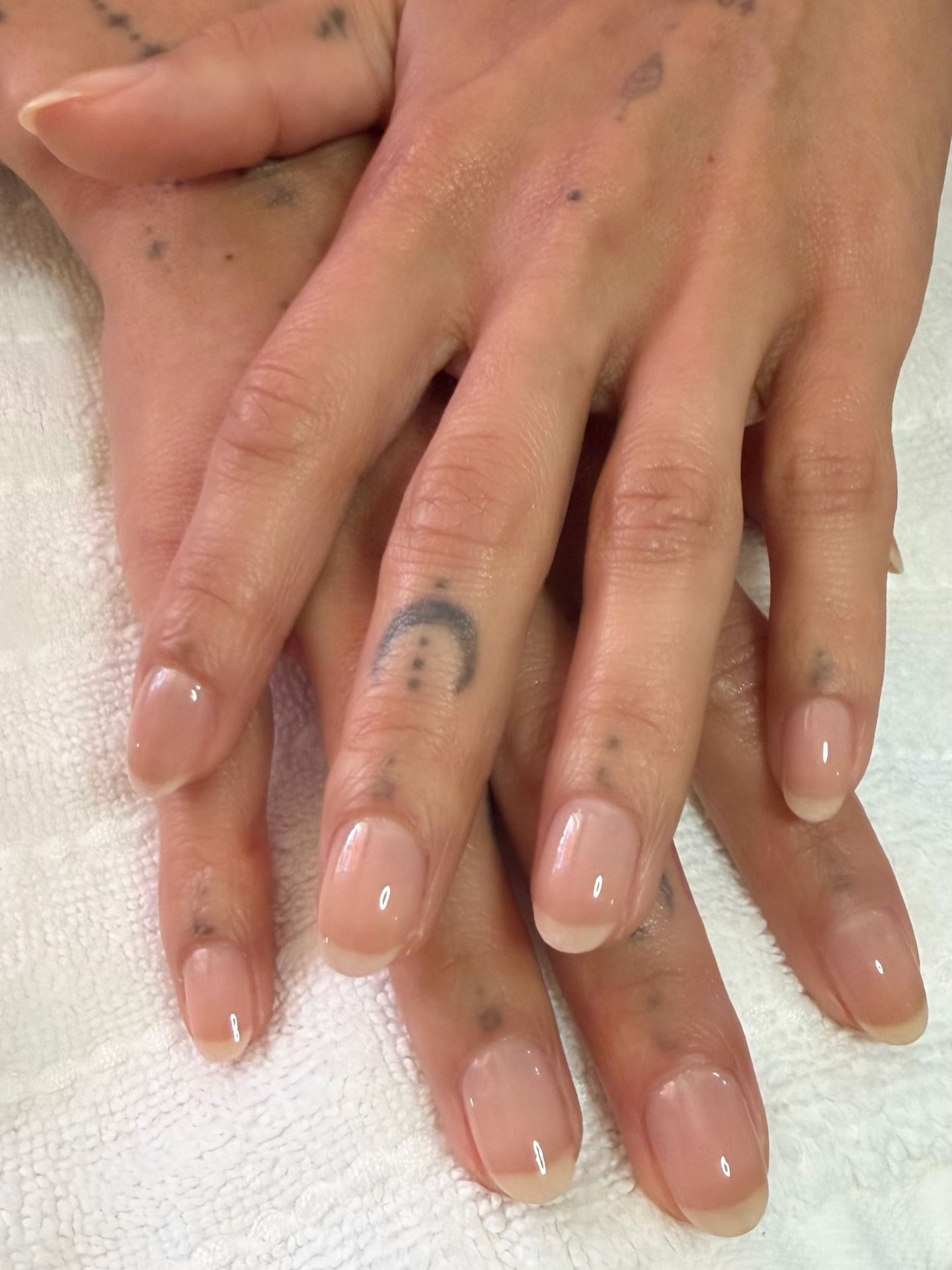 Photo of Zoë Kravitz's cloudy French nails