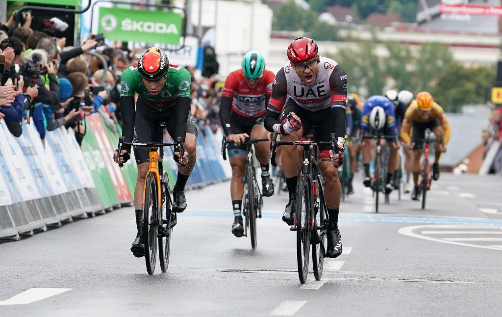 ILMENAU GERMANY AUGUST 27 Alexander Kristoff of Norway and UAE Team Emirates celebrates winning ahead of Phil Bauhaus of Germany and Team Bahrain Victorious green points jersey during the 35th Deutschland Tour 2021 Stage 2 a 1806km stage from Sangerhausen to Ilmenau DeineTour on August 27 2021 in Ilmenau Germany Photo by Christian KasparBartkeGetty Images