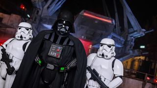 Darth Vader flanked by classic Stormtroopers at Star Wars: Galaxy's Edge at Disneyland