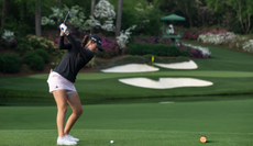 Asterisk Talley at the top of her backswing at Augusta National