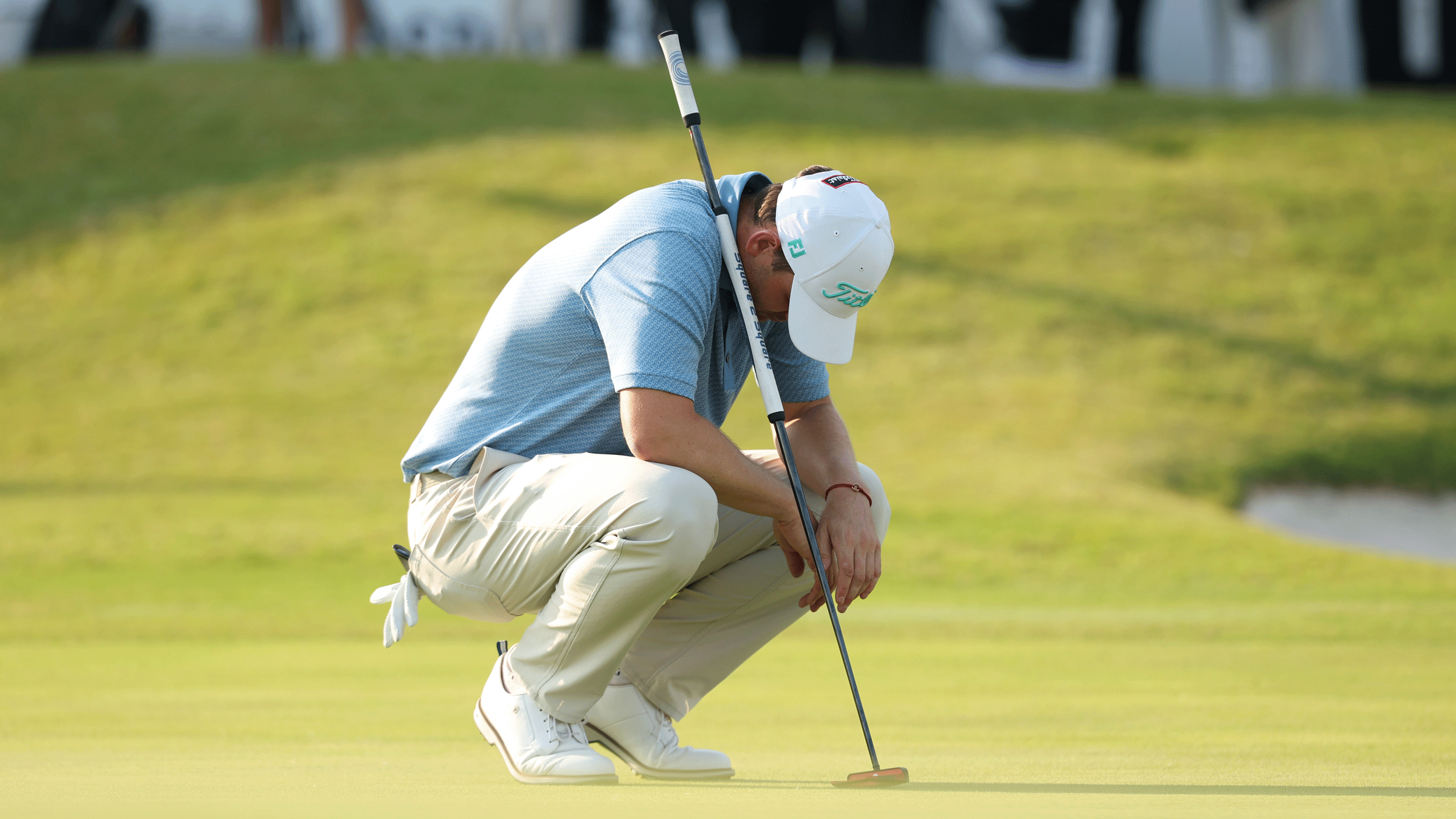 Bernd Wiesberger crouches and puts his head down after winning the 2026 Volvo China Open