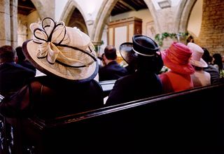 wearing a hat to a wedding