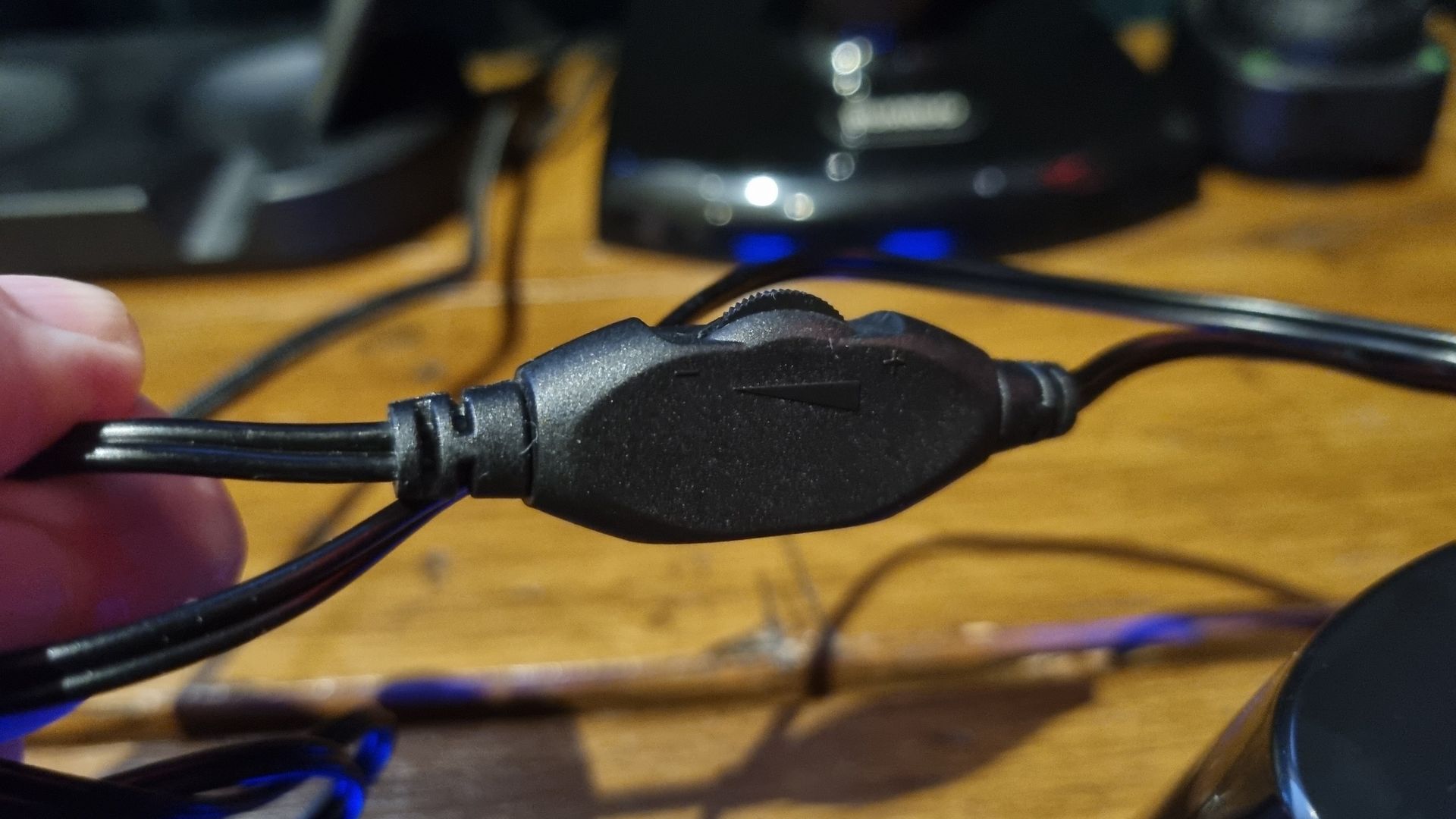 The Amazon Basics Stereo 2.0 speakers on a desktop, shot from various angles