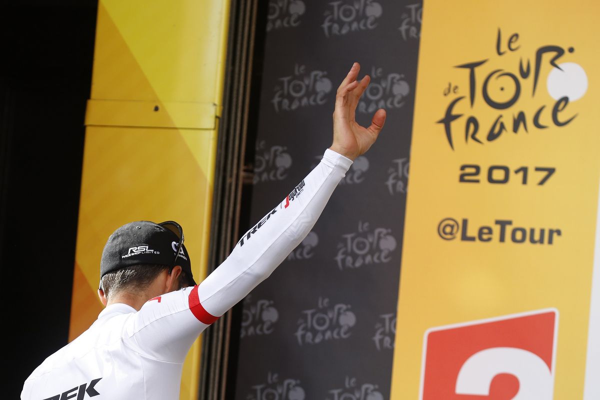 Alberto Contador (Trek-Segafredo) waves as he exits the podium
