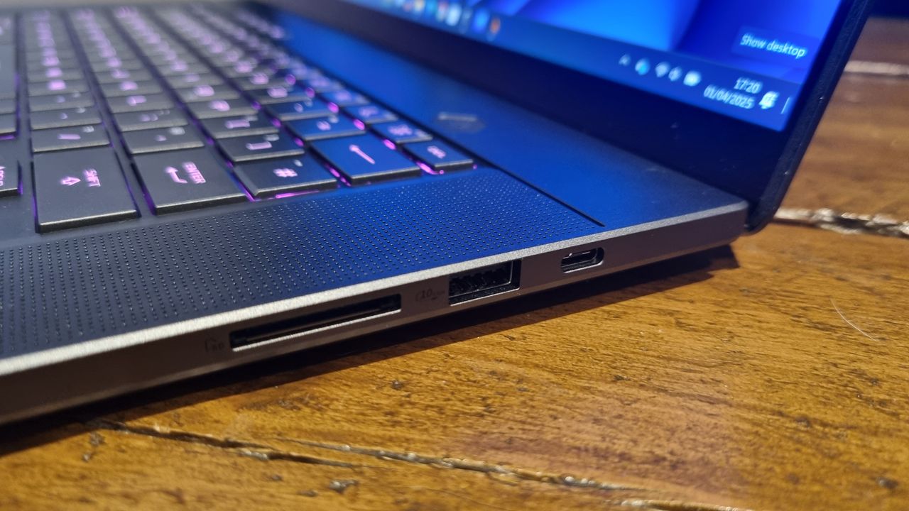 The right side of the Asus ROG Zephyrus G16 gaming laptop showing an extra USB port and SD card socket