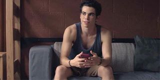 Cameron Boyce sits on dorm couch in Mrs. Fletcher premiere HBO