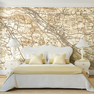 bedroom with map printed wall