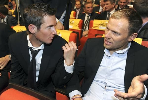 Frank Schleck and Thor Hushovd chat at the Tour presentation.
