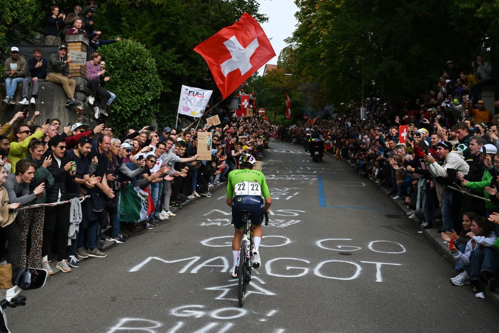 ZURICH SWITZERLAND SEPTEMBER 29 Detailed view of Tadej Pogacar of Team Slovenia competes in the breakaway while fans cheers during the 97th UCI Cycling World Championships Zurich 2024 Mens Elite Road Race a 2739km one day race from Winterthur to Zurich on September 29 2024 in Zurich Switzerland Photo by Dario BelingheriGetty Images