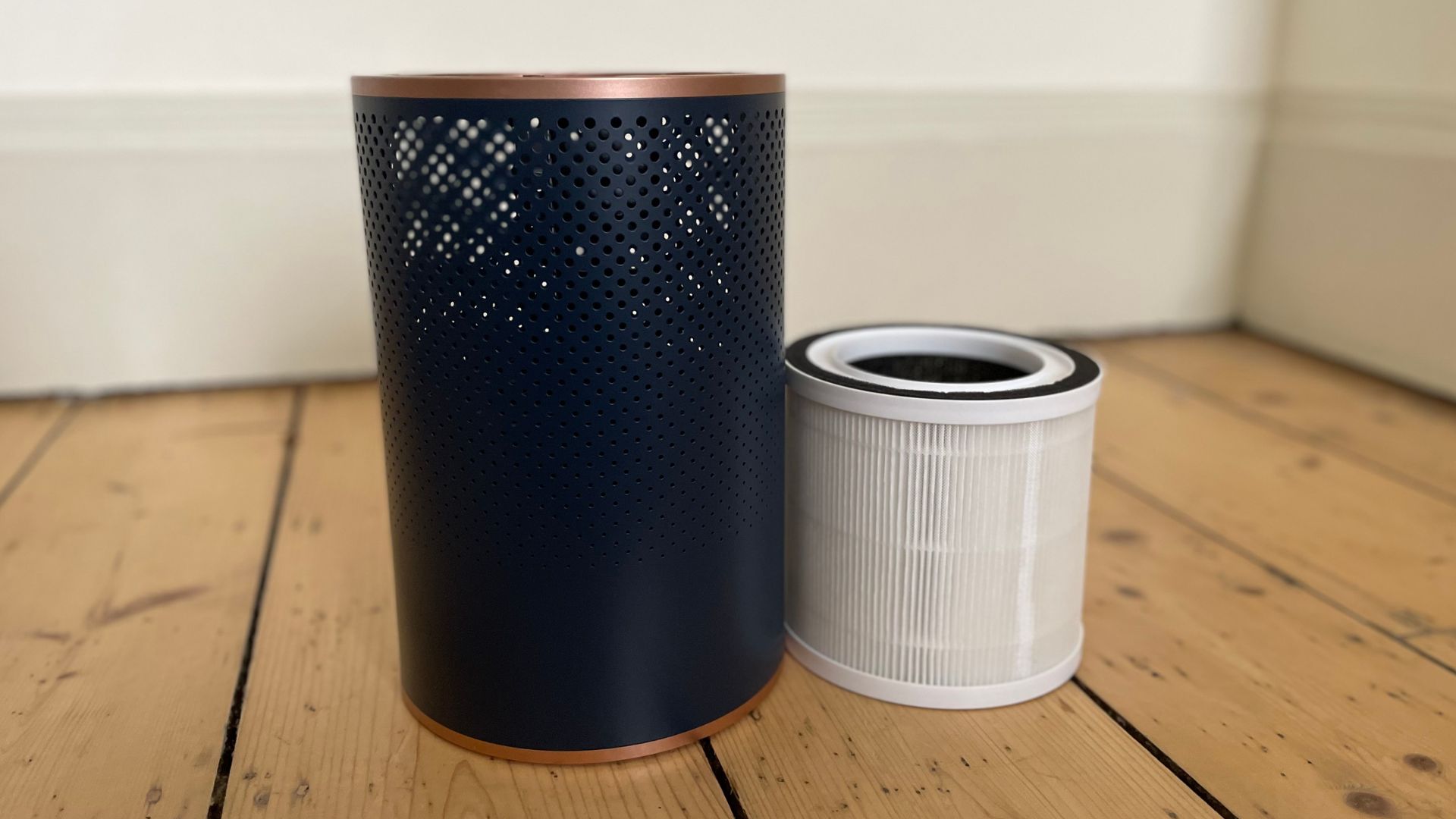 Tower Air Purifier next to its filter