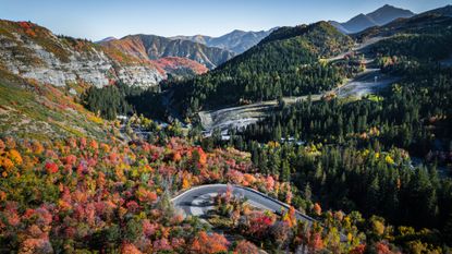 An aerial view of the fall foliage and some snow at Sundance Mountain Resort