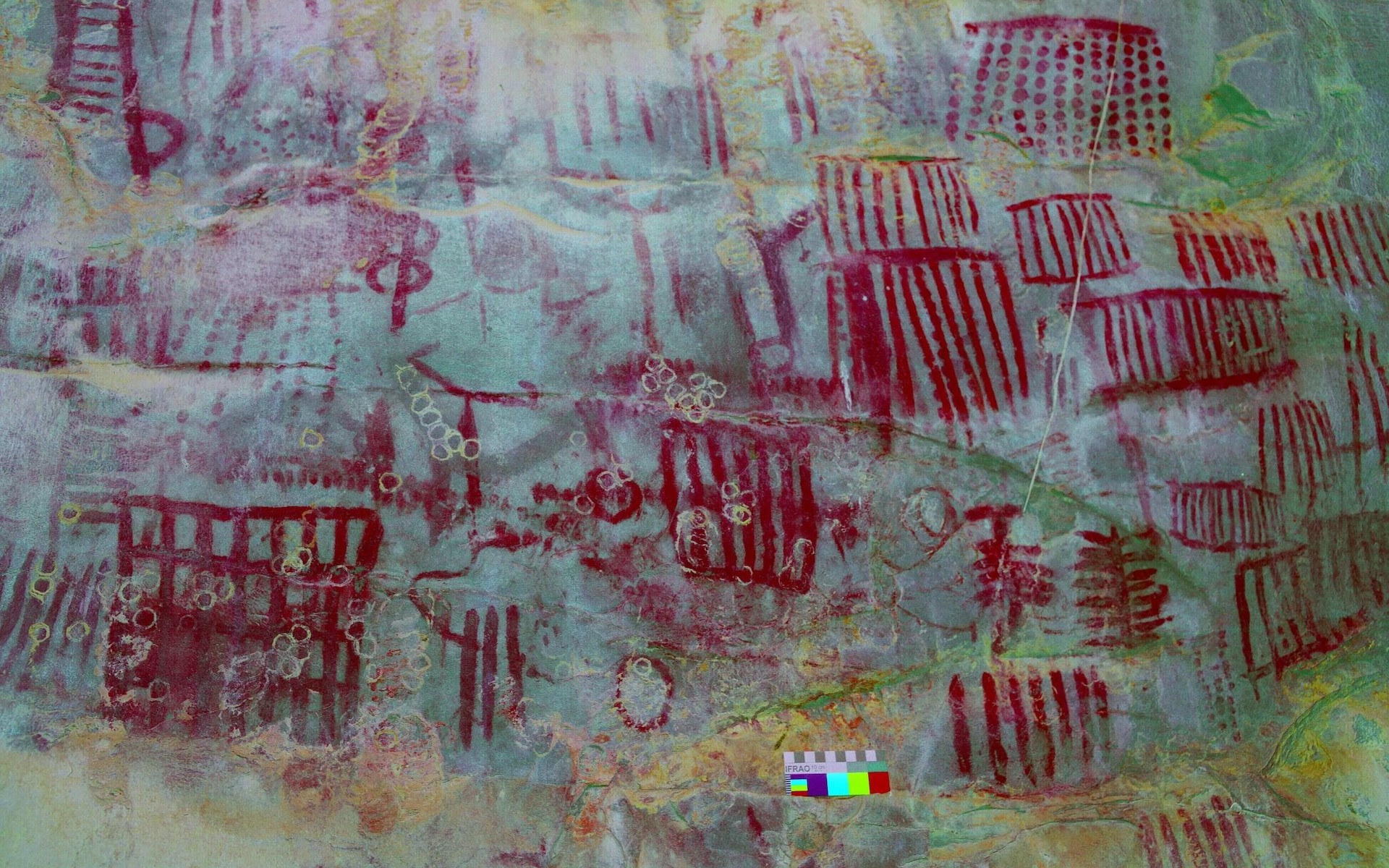 An enhanced view showing a close up of some of the rock art.