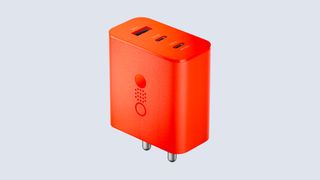CMF by Nothing; an orange GaN charger