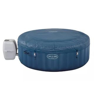 Dark blue hot tub with cover