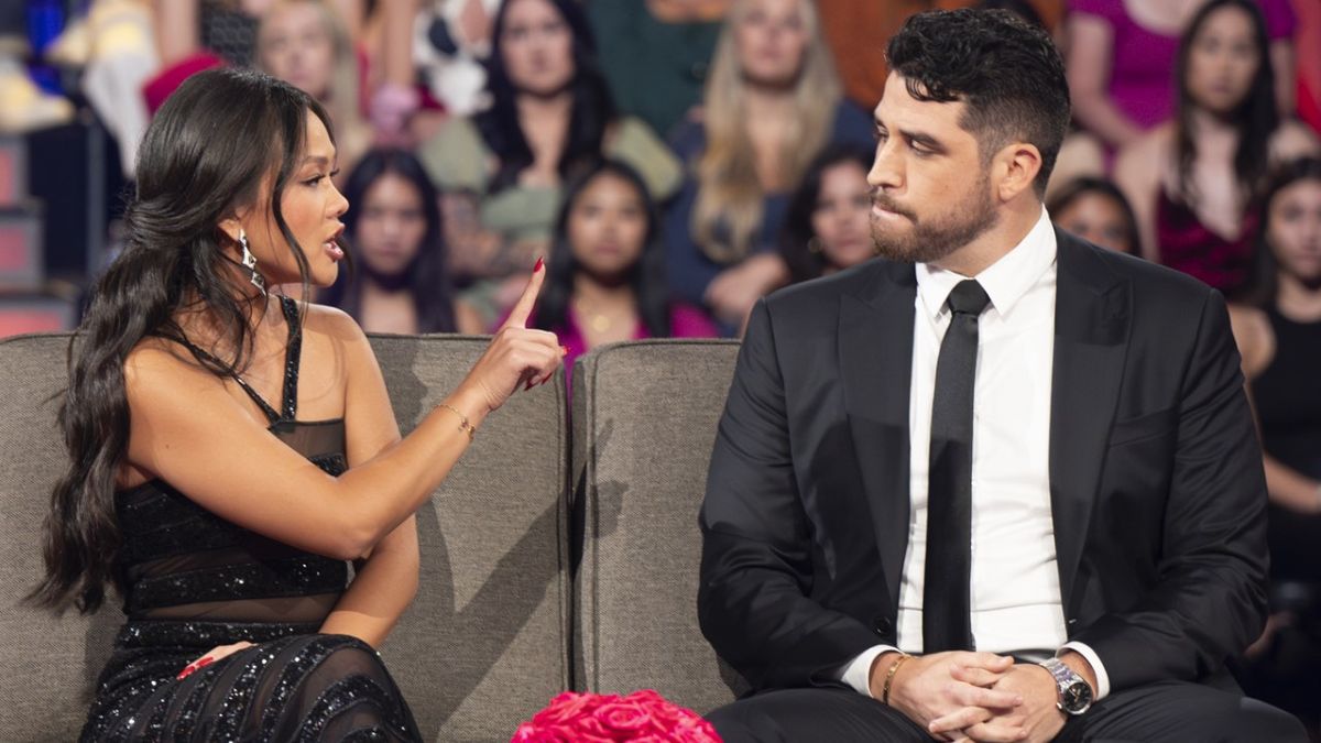 Jenn Tran holds her finger up at Devin Strader at The Bachelorette Season 21 finale that aired September 3, 2024, on ABC.