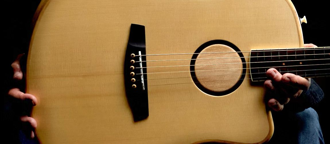 A photo showing details of the L.R. Baggs acoustic-electric guitar