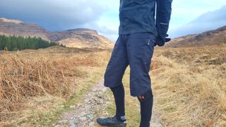 7mesh Revo shorts being worn in a mountainous setting