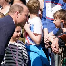 Prince William meets a young fan who asks him whether Prince William is coming to meet them anytime soon