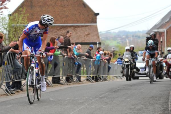 Chavanel looks back to see Cancellara coming up on the Valkenberg