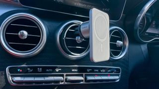 Belkin Car Vent Mount PRO with MagSafe installed on a car dash vent, viewed from the side