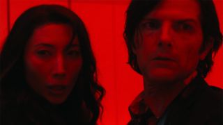 Gemma and Mark in a red-lit room in Severance season 2 episode 10