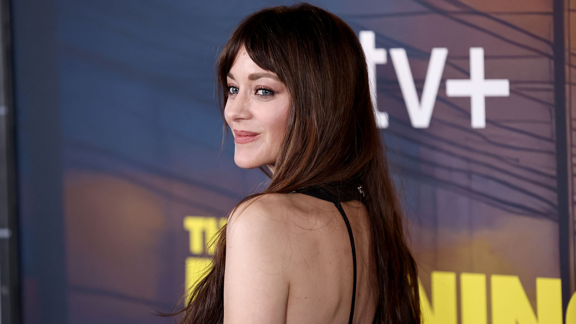 Marion Cotillard wears a metallic Chanel tank top