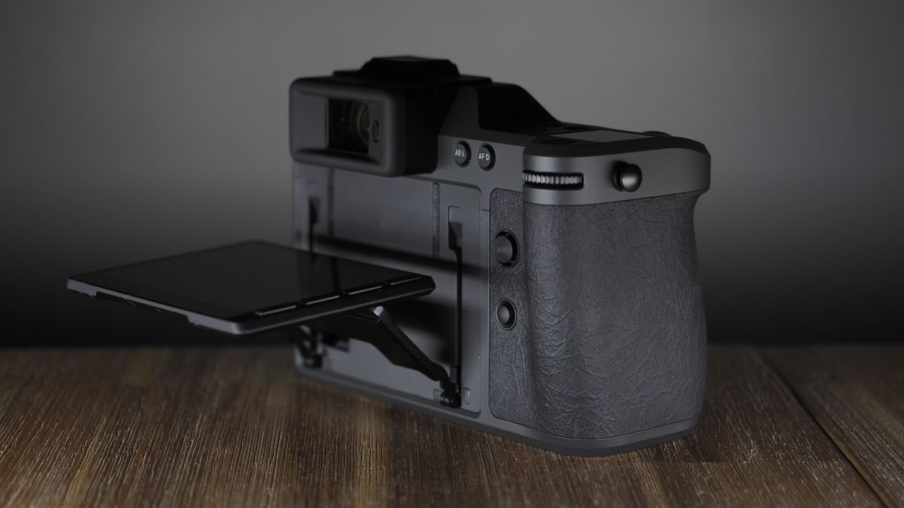 Hasselblad X2D II 100C on a wooden surface