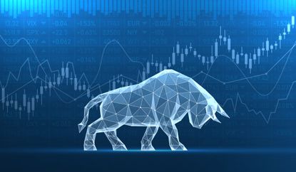 Glass bull on a background of stock quotes