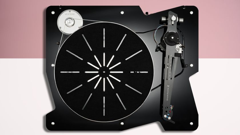 Vertere DG-X turntable on a pink/white TechRadar background