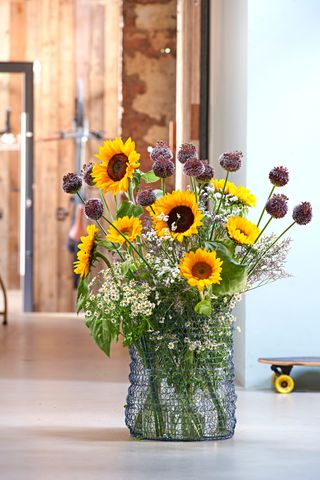 sunflowers in a large vase