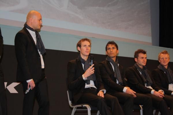Andy Schleck talks Tour de France while team boss Nygaard looks on