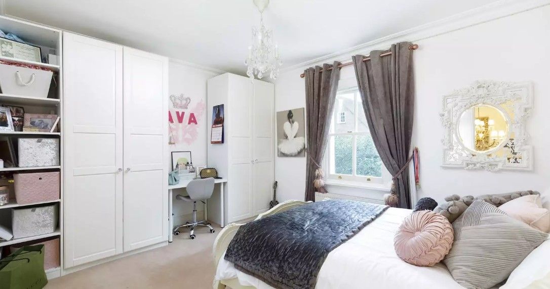 The children's bedroom has a small office space and the window looks out onto the large garden