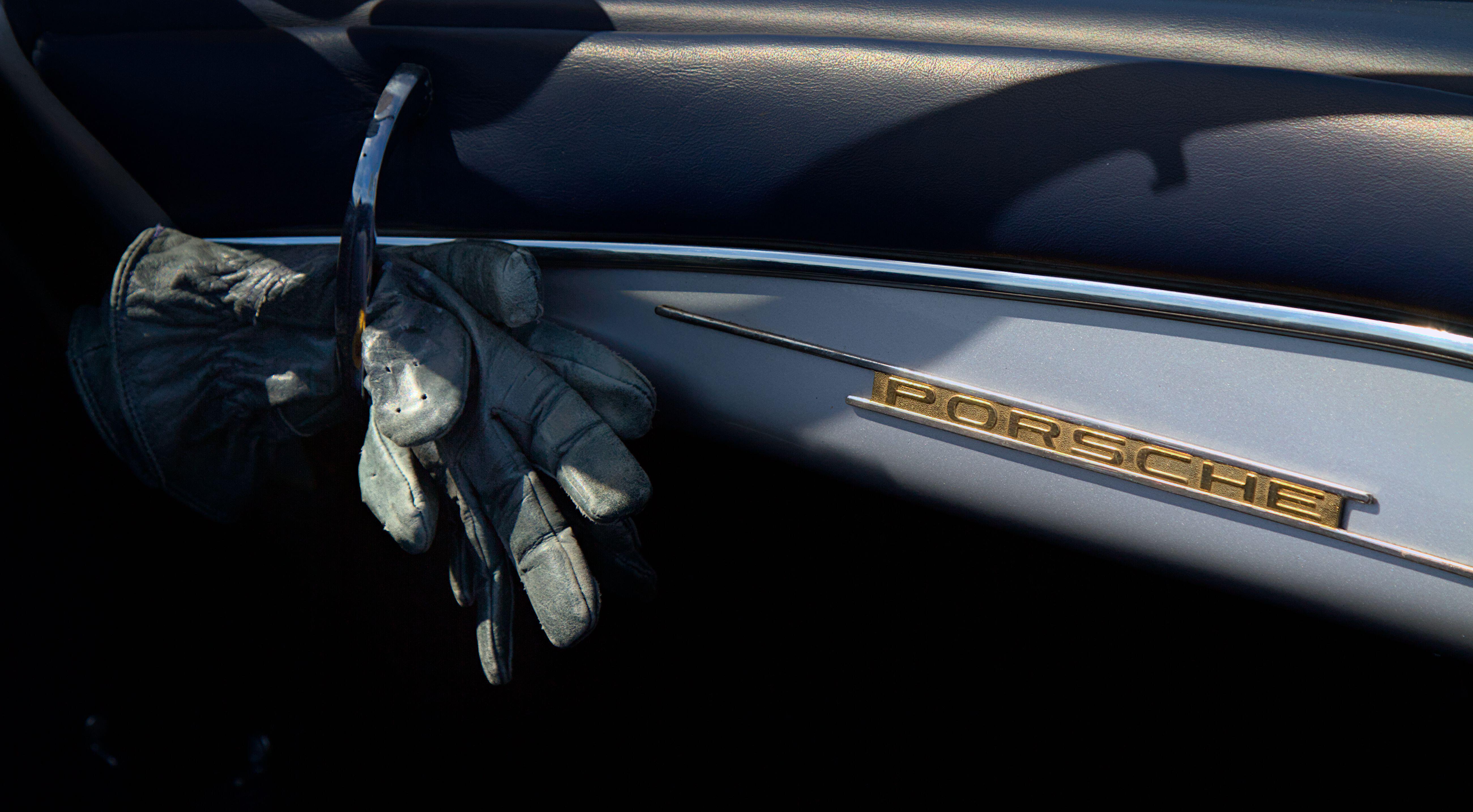 Dashboard Of A 1956 Porsche Speedster 356A Vintage Motor Vehicle With Old Worn Leather Driving Gloves, UK