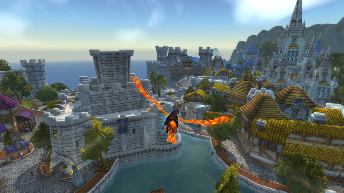 WoW Trading Post - a character is flying above Stormwind City on the Cindermane Charger mount