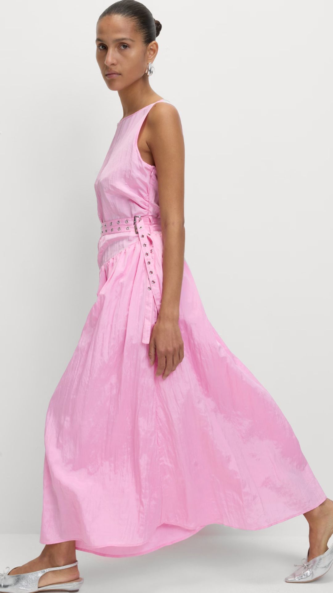 a model wearing the M&S pink midi dress