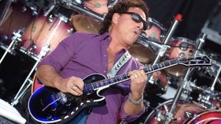 Neal Schon of Journey performs at Shoreline Amphitheatre on August 26, 2006 in Mountain View, California