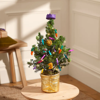 mini christmas tree with christmas dinner inspired decorations battery powered lights and gold fabric pot