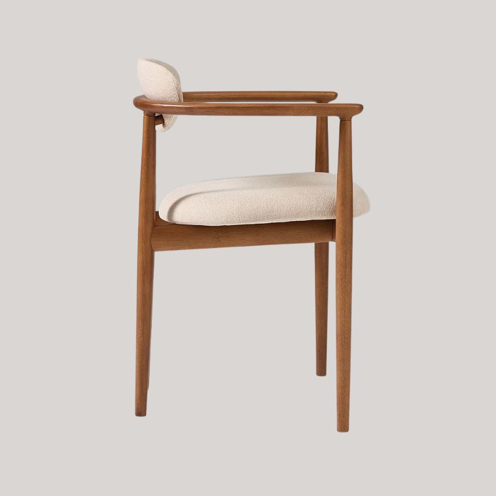 West Elm UK Edison Dining Chair in light wood and sherling against pale grey background.